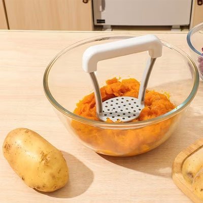 Presse-purée manche antidérapant, effort minimal et purée lisse